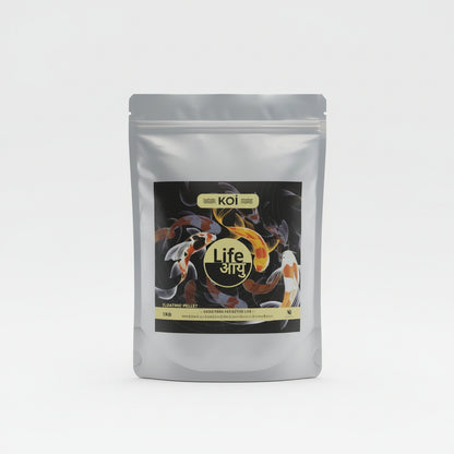 A 1kg stand-up pouch of Koi Life Aayu floating pellet fish food, featuring koi fish illustrations on the label, set on a wooden counter with shelves in the background.